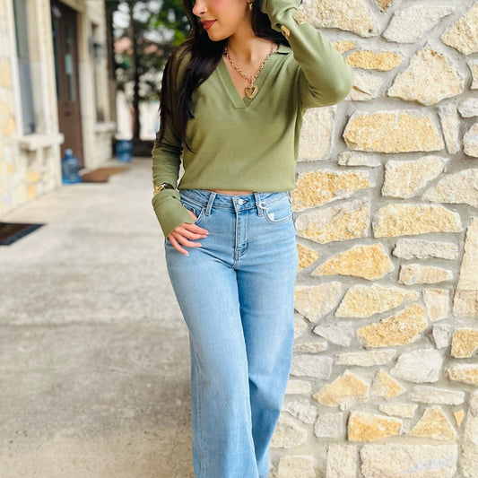 knit polo sweater, lightweight sweater, fall sweater top, collared v-neck sweater, polo knit top, versatile fall staple, classic knit sweater, long sleeve polo top, transitional sweater, chic lightweight knit, timeless fall sweater, neutral wardrobe essential, work to weekend outfit, minimalist sweater, classy knit top, solid color sweater, soft knit polo, everyday fall top, sleek silhouette sweater, cozy chic knit