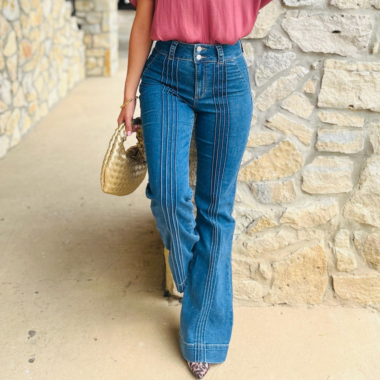 high rise flare jeans, flare denim, stretchy flare jeans, boutique denim, medium wash jeans, double button jeans, pin tuck detail jeans, flattering flare pants, women’s high waist denim, chic flare jeans, everyday denim, trendy boutique jeans, comfortable stretch jeans, classic blue flare jeans, leg-lengthening jeans, polished denim look, dressy flare jeans, casual work jeans, must-have fall denim, versatile blue jeans, stylish flare fit, comfy flattering jeans, wardrobe staple denim