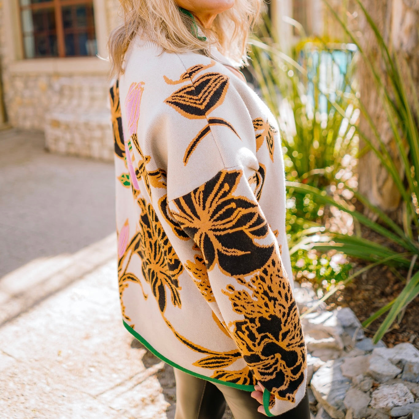 floral pullover sweater, half zip sweater, mock neck sweater, oversized floral sweater, botanical print sweater, fall statement sweater, cozy knit pullover, beige floral sweater, bold pattern sweater, colorful fall sweater, trendy knit top, artistic fall outfit, warm winter sweater, contrast trim sweater, stylish cozy knit, modern floral design sweater, chic fall fashion, relaxed fit sweater, statement knitwear, soft knit pullover