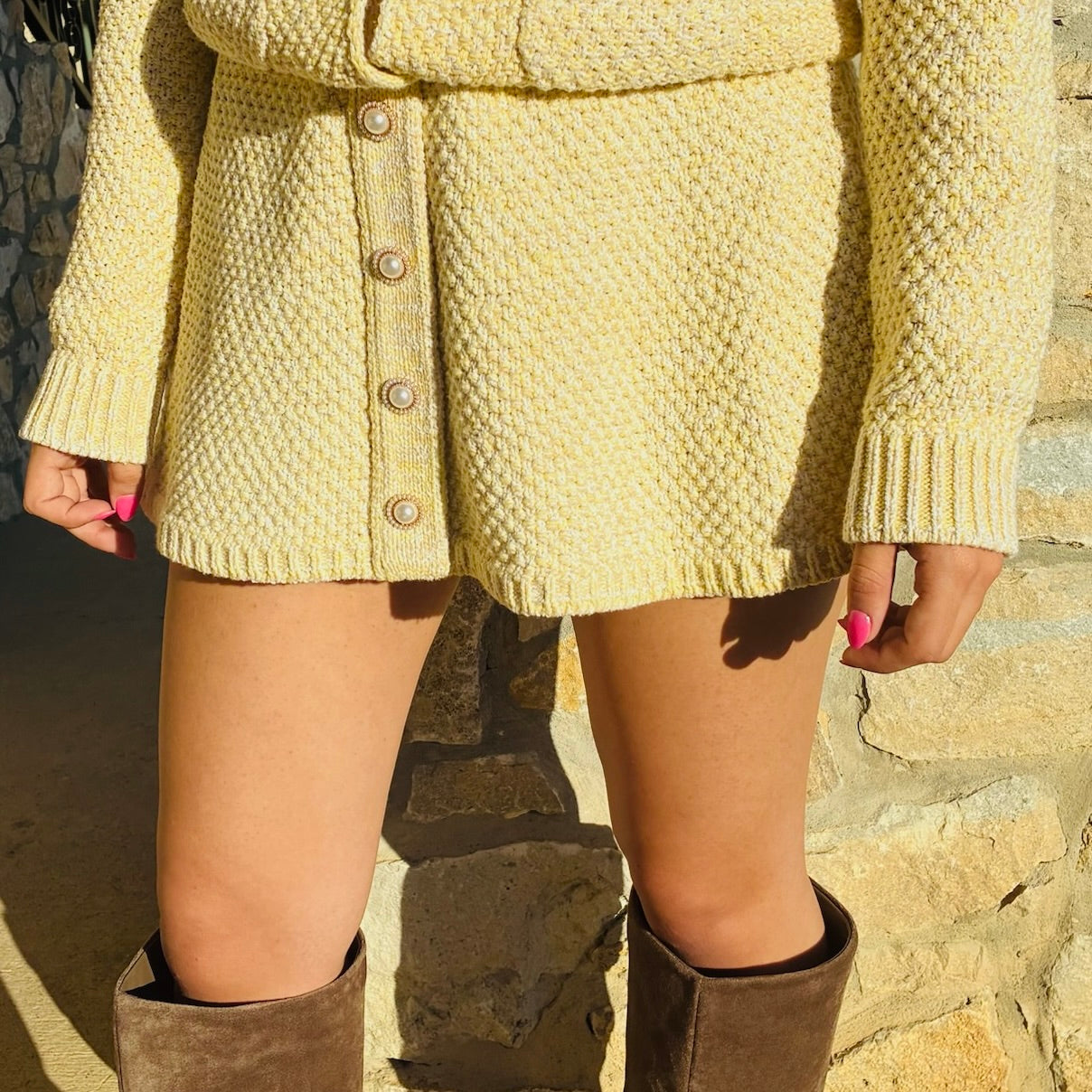 pearl button skirt, matching knit skirt, textured knit skirt women, cotton knit skirt, ivory knit skirt, navy knit skirt, button front skirt women, pearl detail skirt, elevated everyday skirt, polished knit skirt, feminine wardrobe staple, classic silhouette skirt, ribbed waist knit skirt, dressy casual skirt women, fall to spring skirt, boutique women’s skirts, coordinated set skirt, skirt and cardigan set, refined knitwear women