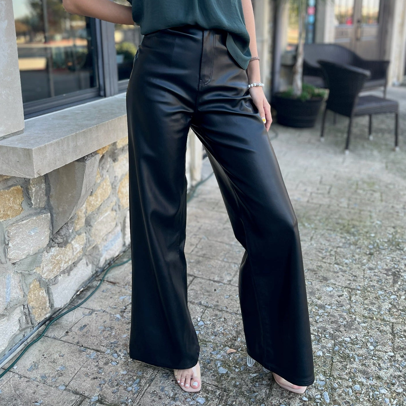 leather pants, vegan leather pants, wide leg pants, black leather pants, zip-fly pants, chic pants, on-trend pants, flattering pants, wardrobe essential, versatile pants, front pockets, back pockets, women's fashion, night out outfit, elevated style, timeless pants, winter style, winter outfits, going out pants, NYE, new years outfit, christmas pants, christmas outfit, winter staples