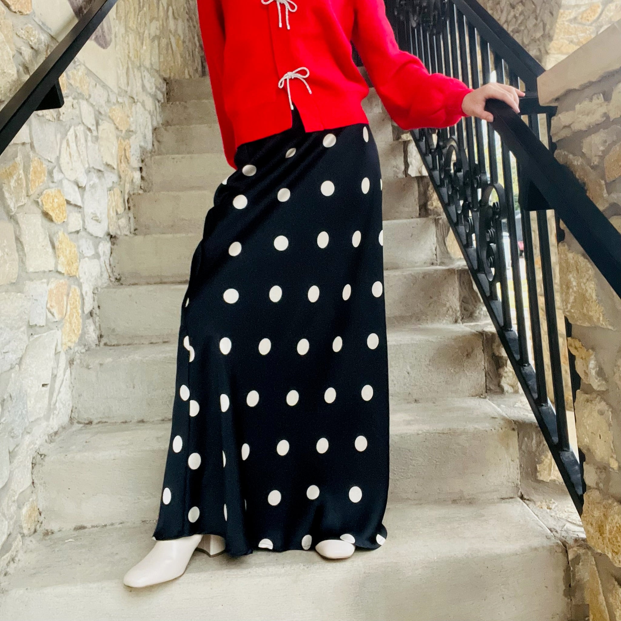 black midi skirt, polka dot midi skirt, cream polka dots, fitted midi skirt, Le Lis skirt, chic midi skirt, classic polka dot skirt, transitional wardrobe piece, fall midi skirt, winter midi skirt, versatile black skirt, workwear skirt, dinner outfit skirt, concert outfit skirt, game day skirt, elevated basics, boutique midi skirt, stretchy midi skirt, polyester spandex skirt, timeless polka dot print, neutral print skirt