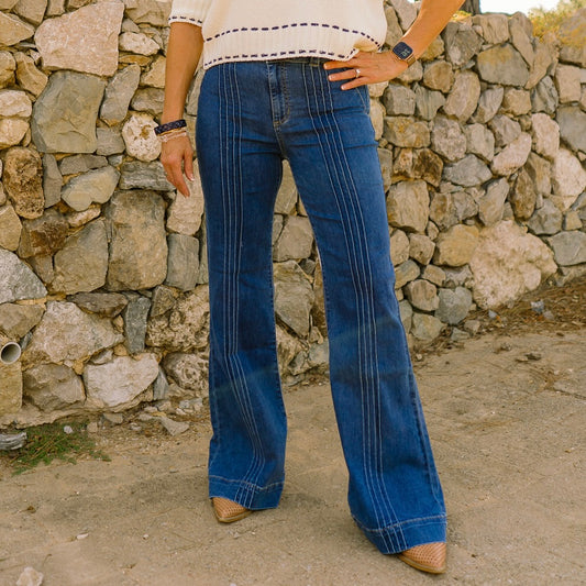 high rise flare jeans, flare denim, stretchy flare jeans, boutique denim, medium wash jeans, double button jeans, pin tuck detail jeans, flattering flare pants, women’s high waist denim, chic flare jeans, everyday denim, trendy boutique jeans, comfortable stretch jeans, classic blue flare jeans, leg-lengthening jeans, polished denim look, dressy flare jeans, casual work jeans, must-have fall denim, versatile blue jeans, stylish flare fit, comfy flattering jeans, wardrobe staple denim