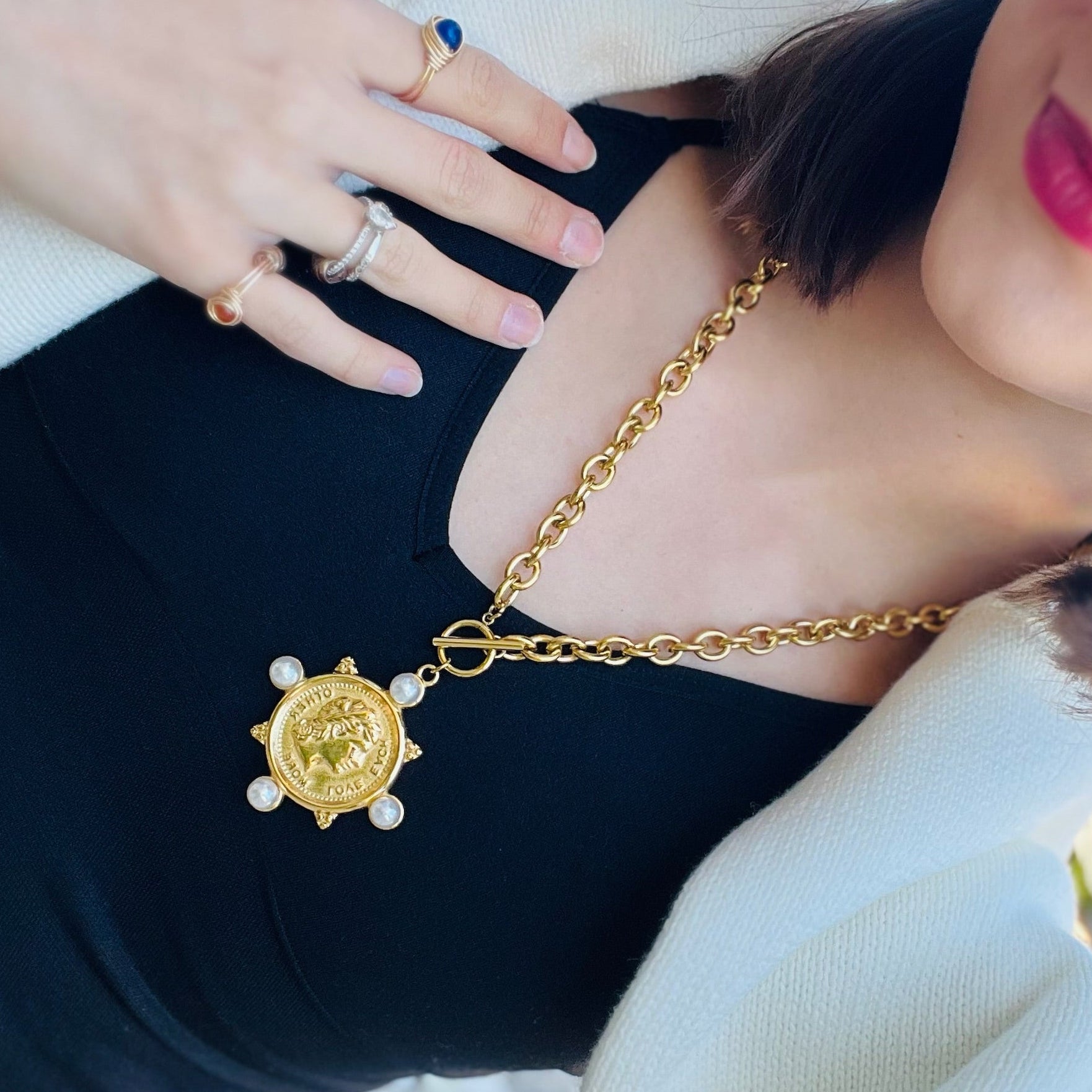 charm necklace, coin pendant necklace, pearl detail necklace, toggle clasp necklace, gold chain statement necklace, water resistant necklace, thick chain necklace, elegant coin charm jewelry, modern pearl charm necklace, versatile layering necklace, gold charm pendant necklace, holiday statement necklace