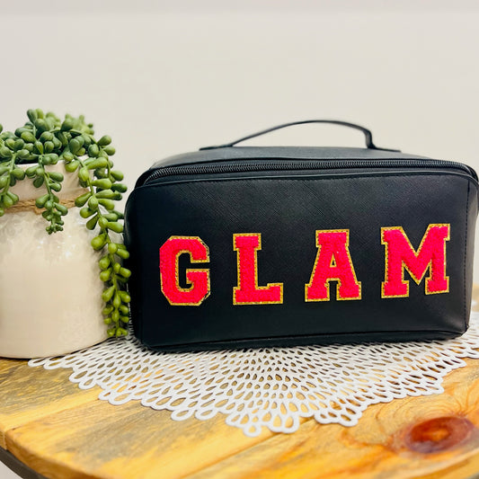 glam cosmetic bag, glam makeup bag, travel makeup bag, vanity organizer, black makeup bag, hot pink glam letters, flat lay makeup bag, faux leather cosmetic case, travel toiletry bag, large makeup organizer, trendy cosmetic bag, gift for her, makeup storage bag, glam patch letters, stylish makeup pouch, travel beauty bag, cosmetic bag with handle, makeup lover gift, beauty essentials organizer, girly travel bag, spacious makeup case, college girl gift, cute toiletry bag, bachelorette gift idea