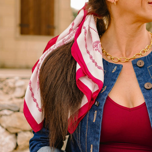 red and white bandana, patterned bandana, satin bandana, lightweight scarf, versatile accessory, patriotic bandana, game day bandana, holiday outfit accessory, western bandana, red print bandana, hair scarf, neck scarf, bandana for bags, boot bandana accessory, boutique bandana, stylish bandana, summer accessory, 4th of July bandana, feminine bandana, trendy bandana for women, red border bandana, printed satin scarf, all season accessory