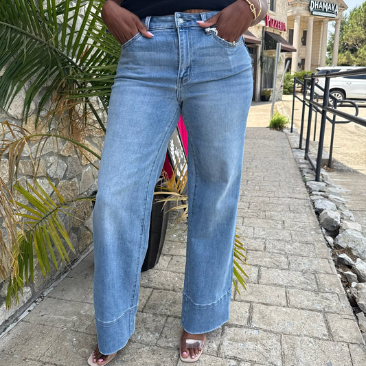 high rise wide leg jeans, A-line denim, raw hem jeans, wide leg denim pants, high waist jeans, comfortable stretch jeans, boutique denim, women’s wide leg jeans, casual chic denim, versatile denim pants, everyday denim, trendy high rise jeans, flowy wide leg jeans, stylish wide leg trousers, vintage inspired jeans, polished casual denim, fashion forward denim, leg-lengthening jeans, high waist A-line jeans, raw edge denim, relaxed fit denim, wide leg outfit, denim essentials for women, modern boutique jeans
