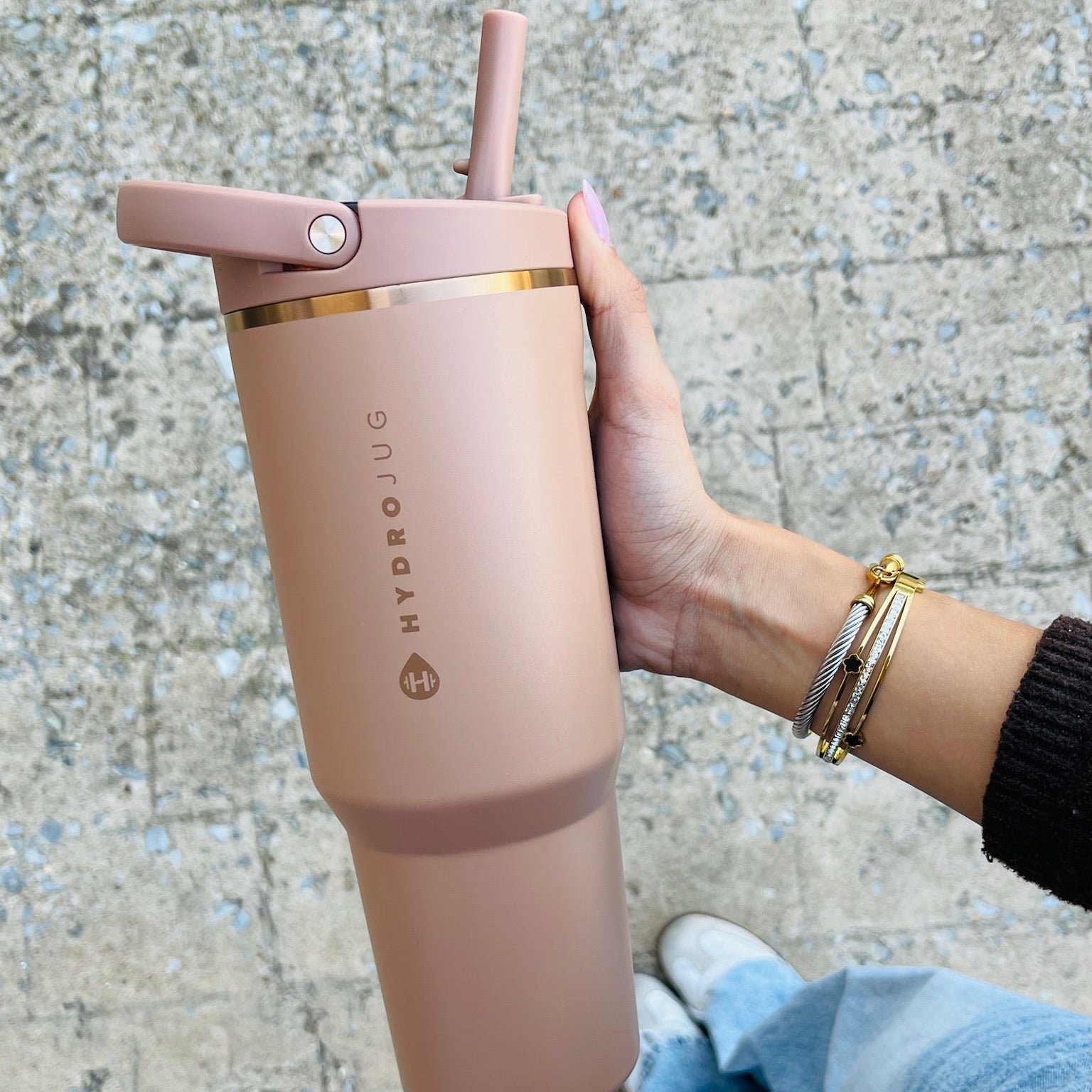 40oz water bottle, large sport water bottle, leakproof water bottle, no spill water bottle, Hydrojug bottle, carrying strap water bottle, flip straw water bottle, ergonomic water bottle, workout water bottle, gym water bottle, school water bottle, commuter water bottle, reusable water bottle, hydration bottle, colorful water bottle, patterned water bottle, durable water bottle, outdoor water bottle, fitness water bottle, everyday water bottle