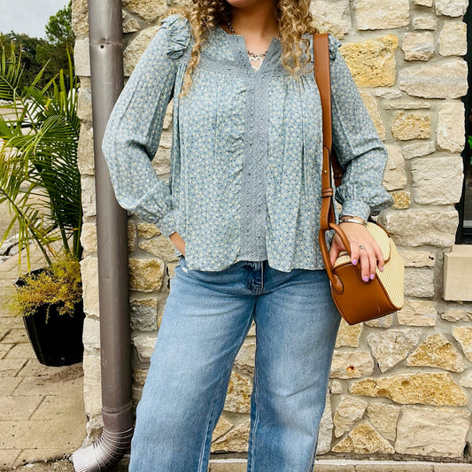 boho blouse, floral blouse, ditsy floral top, ruffle shoulder blouse, v neck floral top, long sleeve blouse, feminine boho top, breezy summer blouse, spring floral blouse, fall transition top, lined floral blouse, cotton lace detail top, button back blouse, boutique floral top, casual chic blouse, romantic boho style, cute floral shirt, lightweight floral top, versatile blouse, trendy boho top