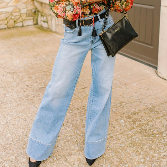 high rise wide leg jeans, A-line denim, raw hem jeans, wide leg denim pants, high waist jeans, comfortable stretch jeans, boutique denim, women’s wide leg jeans, casual chic denim, versatile denim pants, everyday denim, trendy high rise jeans, flowy wide leg jeans, stylish wide leg trousers, vintage inspired jeans, polished casual denim, fashion forward denim, leg-lengthening jeans, high waist A-line jeans, raw edge denim, relaxed fit denim, wide leg outfit, denim essentials for women, modern boutique jeans