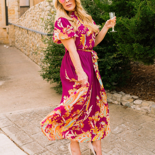 printed midi dress, colorful patterned dress, self-tie waist dress, pleated midi dress, ruffled edge dress, short sleeve midi dress, high neck dress, elegant printed dress, boutique women’s dress, summer wedding dress, brunch outfit dress, garden party dress, vibrant print dress, flattering midi dress, versatile women’s dress, chic day to night dress, statement midi dress, feminine silhouette dress, patterned summer dress, trendy midi dress, stylish printed dress, polished outfit dress, boutique fashion dre