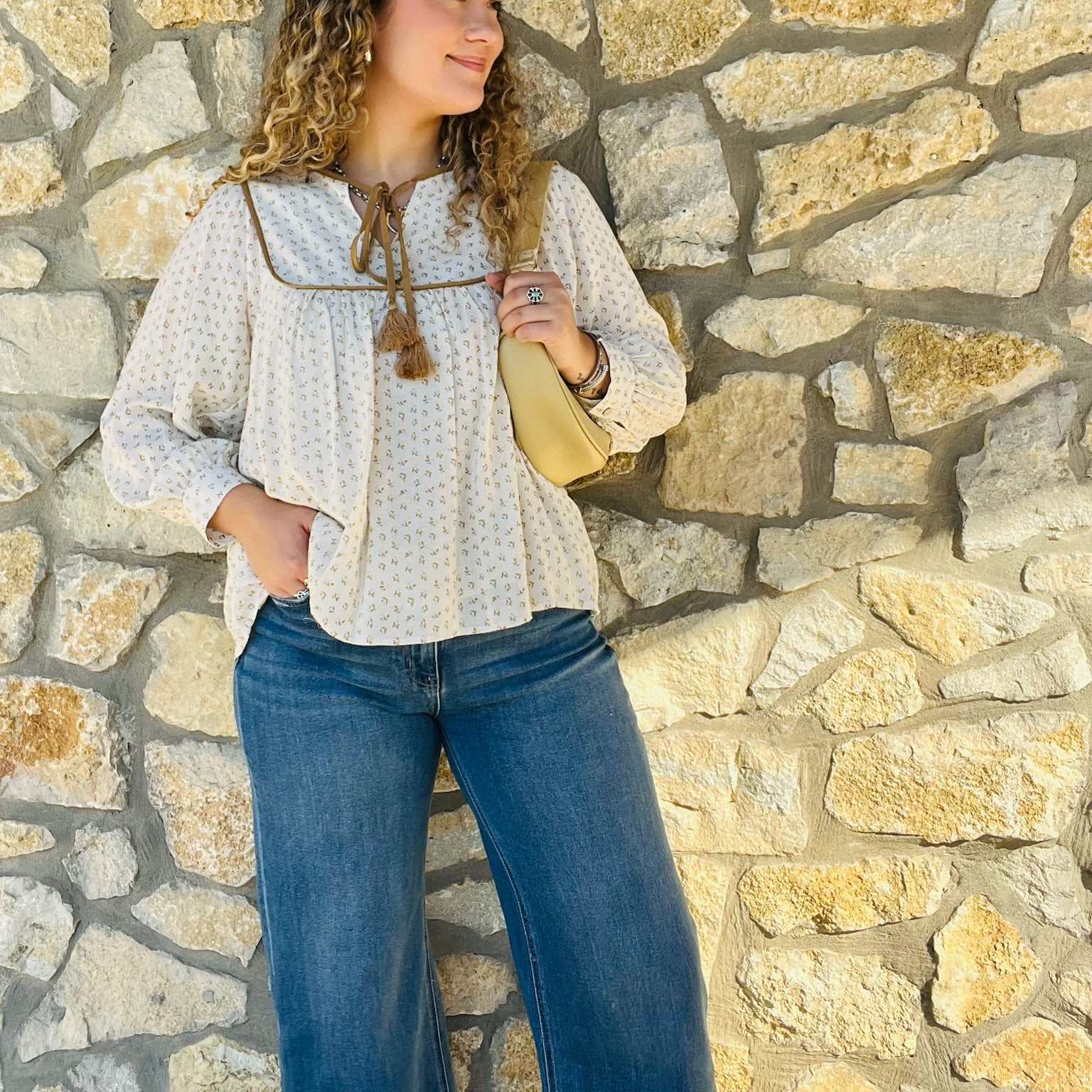 ditsy print blouse, boho floral blouse, linen long sleeve top, tassel tie blouse, feminine boho blouse, boutique fall top, gold trim blouse, lightweight printed blouse, bohemian chic shirt, casual floral top, girly fall outfit, boutique blouse for women, floral peasant top, boho fall fashion, soft linen blouse, fall wardrobe staple, relaxed fit blouse, romantic boho style, everyday floral blouse, country chic outfit, trendy boutique top, versatile fall blouse, tassel neckline blouse, boho-inspired