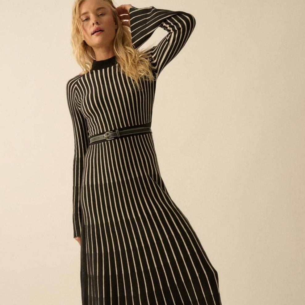 ribbed knit maxi dress, striped maxi dress, black and white knit dress, fall maxi dress, long sleeve sweater dress, mock neck maxi dress, ribbed waistband dress, knit A-line dress, ankle length striped dress, cozy fall dress, city chic maxi dress, relaxed fit sweater dress, bell sleeve knit dress, raglan sleeve maxi dress, cold weather maxi dress, black and white stripe dress, knit maxi for layering, fall fashion dress, long sleeve knitwear dress, ribbed collar maxi dress, warm maxi dress, casual chic fall 