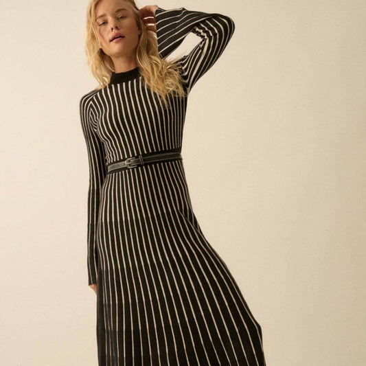 ribbed knit maxi dress, striped maxi dress, black and white knit dress, fall maxi dress, long sleeve sweater dress, mock neck maxi dress, ribbed waistband dress, knit A-line dress, ankle length striped dress, cozy fall dress, city chic maxi dress, relaxed fit sweater dress, bell sleeve knit dress, raglan sleeve maxi dress, cold weather maxi dress, black and white stripe dress, knit maxi for layering, fall fashion dress, long sleeve knitwear dress, ribbed collar maxi dress, warm maxi dress, casual chic fall 