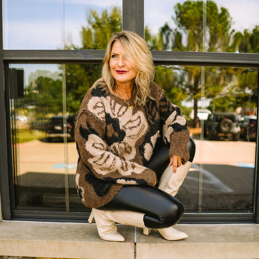 floral fall sweater, cozy fuzzy sweater, floral jacquard knit, warm tone sweater, drop shoulder sweater, round neck fuzzy pullover, ribbed hem sweater, soft floral knit top, cozy fall outfit, long sleeve floral sweater, decorative stitching sweater, textured knit pullover, autumn floral sweater, chic cold weather sweater, fuzzy floral top, comfy fall knitwear, statement floral sweater, casual cozy fall style, feminine fall sweater, soft wool blend sweater