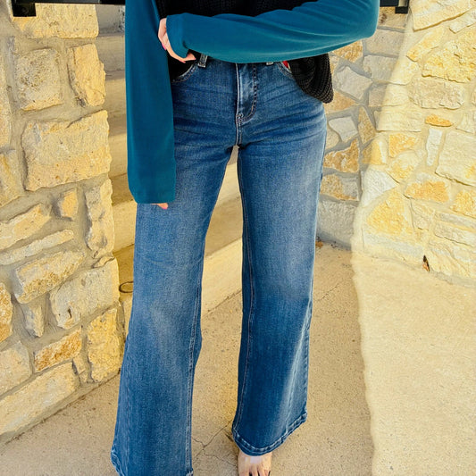 tummy control jeans, high rise wide leg jeans, flattering denim, shaping jeans for women, smoothing panel jeans, comfort stretch denim, wide leg trousers jeans, figure enhancing denim, slimming jeans, distressed wide leg jeans, finished hem jeans, boutique denim, full length wide leg jeans, trendy flattering jeans, tummy smoothing denim, jeans for curvy women, chic wide leg style, stylish comfortable jeans, modern high rise denim, everyday flattering jeans, wide leg fall denim, sculpting high rise jeans