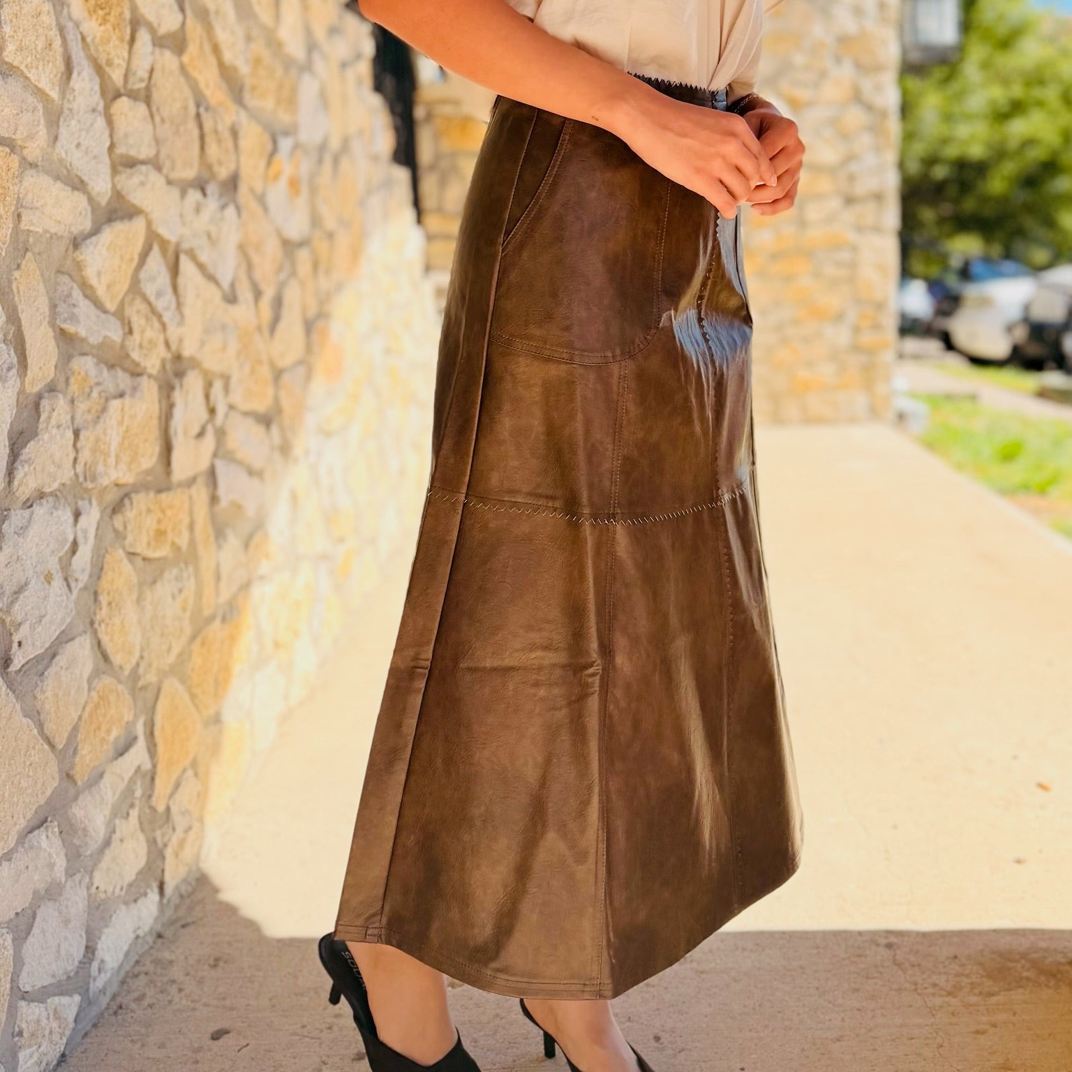 The Celine Faux Leather Midi Skirt
