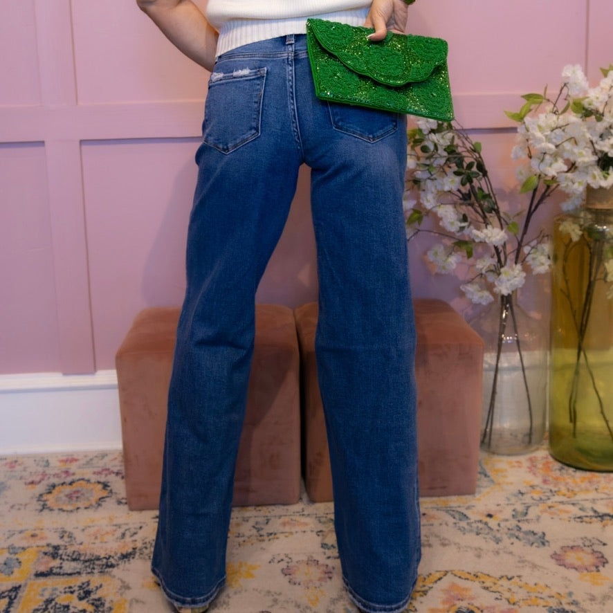 mid rise jeans, wide leg jeans, full length denim, comfort stretch jeans, relaxed fit jeans, slightly distressed denim, women’s wide leg pants, boutique denim, flattering mid rise jeans, long inseam jeans, 34 inch inseam jeans, versatile blue jeans, casual chic denim, everyday wide leg jeans, trendy fall denim, effortless jeans for women, polished wide leg silhouette, elevated basics denim, Sweet Voyage jeans, T6613 jeans, comfortable women’s jeans, classic blue denim, modern wide leg trousers