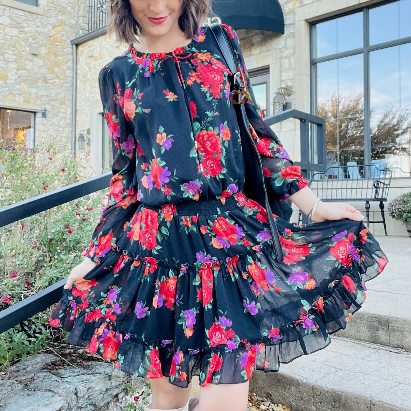 floral print dress, black floral dress, ruffle tiered dress, long sleeve floral mini dress, semi sheer sleeves dress, v notch neckline dress, tie neck dress, fall wedding guest outfit, shower and party dress, boutique floral outfit, feminine floral style, romantic ruffle dress, layered tiered mini dress, floral chiffon dress, lined lightweight dress, multicolor floral pattern, floral dress for events, dinner date outfit, cute boutique dress, black background floral print, boho chic floral dress, fall event 