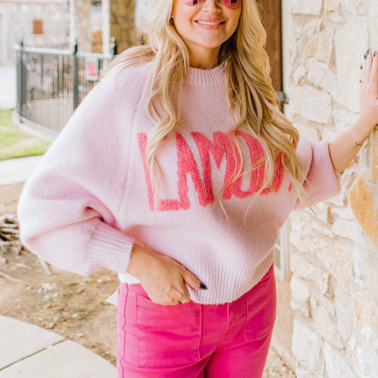 pink sweater, l’amour sweater, love sweater, graphic pullover, cozy chic sweater, valentine sweater, flirty feminine sweater, light pink sweater, pink lettering sweater, relaxed fit pullover, crew neck sweater, ribbed knit sweater, boutique sweater, soft cozy knit, girls night outfit, parisian style sweater, casual chic sweater, cozy gift idea, trendy fall sweater, cute pink sweater