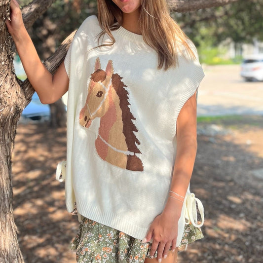 horse graphic sweater, western sweater top, oversized knit top, sleeveless sweater, tie detail sweater, side slit top, casual western sweater, lightweight knit top, acrylic sweater for women, boutique western fashion, horse lover top, trendy graphic sweater, chic oversized sweater, versatile summer knit, layered sweater top, western inspired clothing, statement knit top, stylish sleeveless sweater, casual boutique top, western chic sweater, fun graphic top, unique horse sweater, fall layering sweater