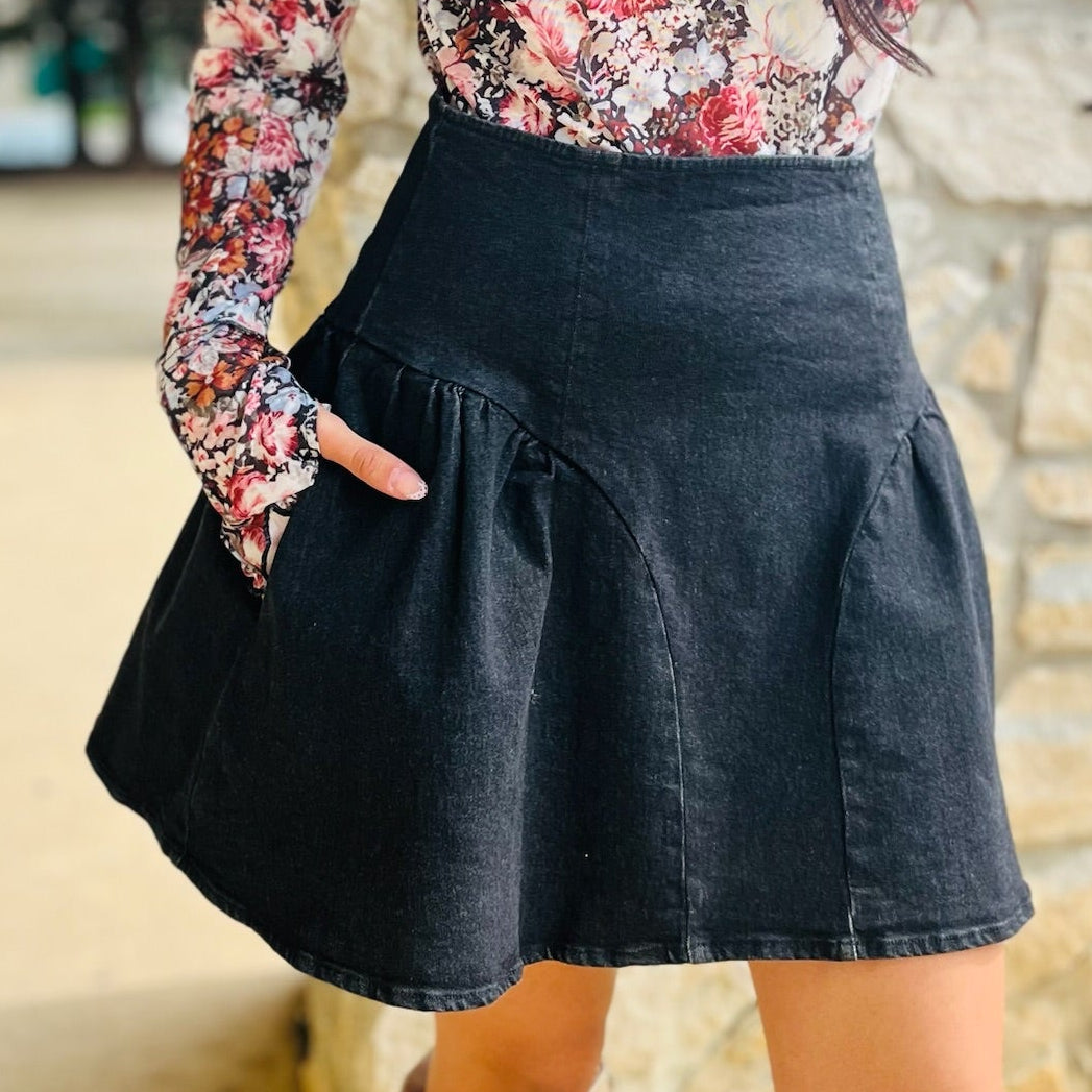 black flare mini skirt, black denim mini skirt, flared mini skirt, stretchy mini skirt, black skirt for all seasons, versatile mini skirt, year-round skirt, fall mini skirt, winter mini skirt, spring mini skirt, summer mini skirt, mini skirt with back zipper, casual black skirt, dressy black mini skirt, comfortable denim skirt, black skirt with stretch, soft denim mini skirt, high waist mini skirt, game day skirt, transitional mini skirt, wardrobe staple skirt, everyday black skirt, flattering mini skirt