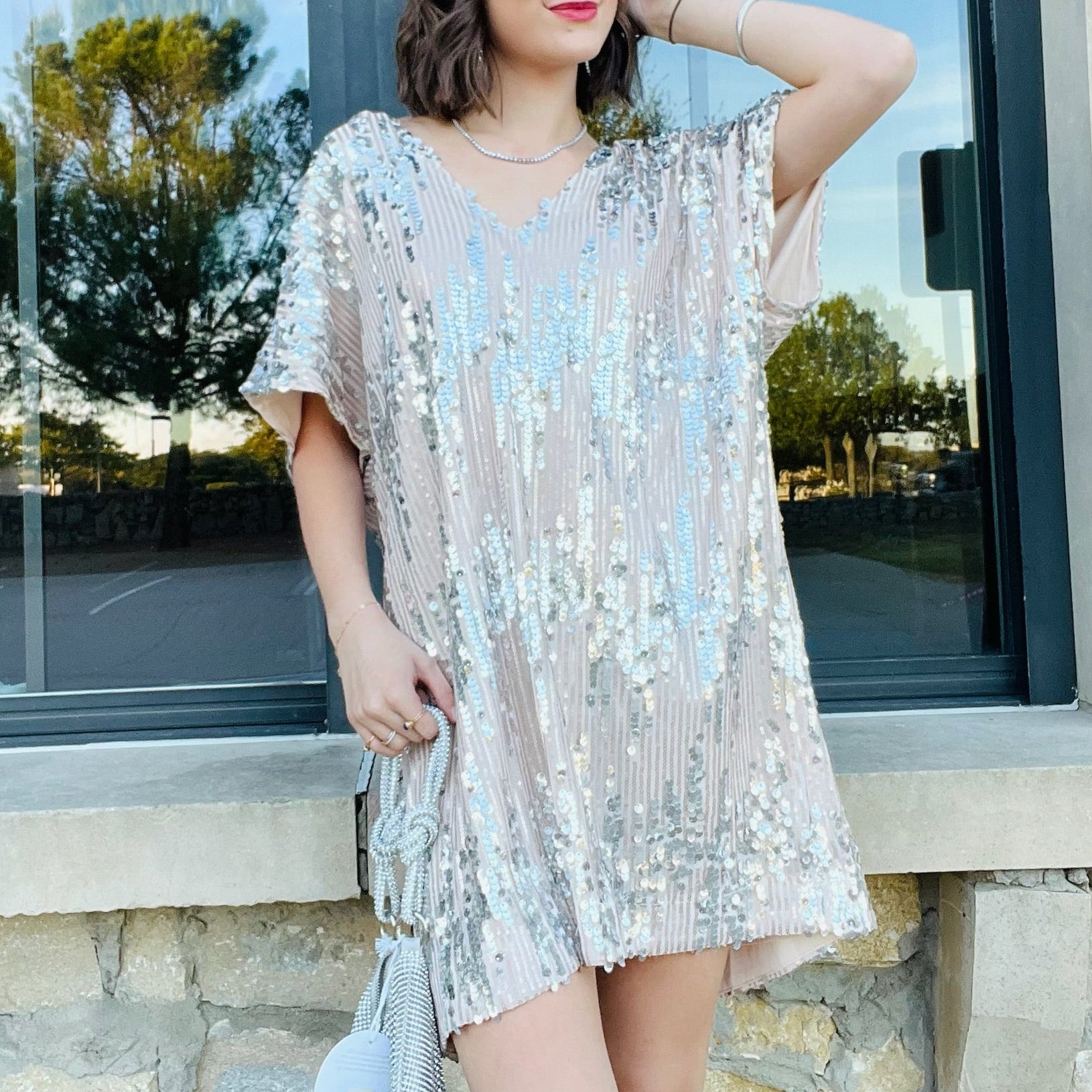 silver sequin dress, sequin mini dress, sparkly party dress, v neck sequin dress, short sleeve tunic dress, holiday party outfit, new year’s eve dress, shimmer mini dress, silver sparkle dress, festive cocktail dress, flowy sequin dress, boutique party dress, glitter mini dress, dazzling silver outfit, celebration dress, sequin event dress, sparkly short sleeve mini, metallic sequin dress, lightweight lined dress, comfortable party dress, statement sparkle outfit, silver shimmer mini, dance party dress