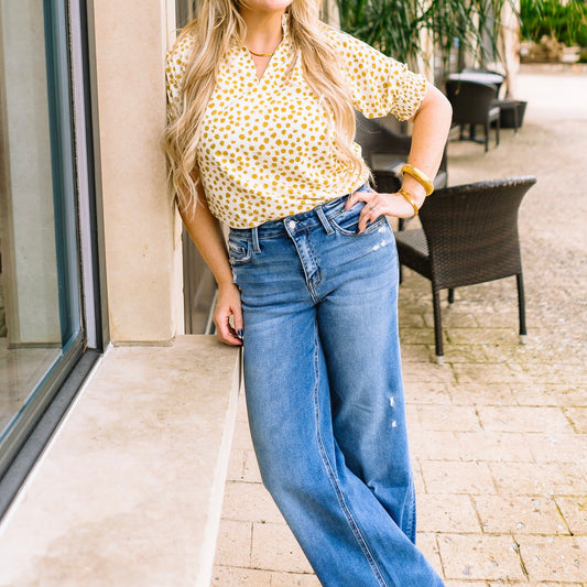 dot print blouse, jacquard dot top, puff sleeve blouse, smocked neckline top, lightweight women's blouse, business casual top, office outfit blouse, chic everyday top, V-neck blouse, feminine blouse for work, weekend brunch top, boutique women's top, casual yet polished top, versatile blouse for women, stylish dot print top, trendy puff sleeve top, smocked cuff blouse, sophisticated workwear top, soft breathable blouse, timeless women’s top, elegant dot blouse, neutral printed blouse, office to weekend top,