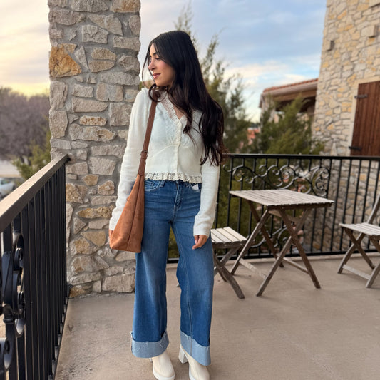 cream knit top, lace contrast top, button down cardigan, feminine sweater top, ruffle hem top, V neck knit top, cream lace cardigan, flirty knit blouse, romantic sweater, cozy chic top, boutique knitwear, girly lace top, soft neutral sweater, brunch outfit top, coffee date outfit, fall layering piece, sweet feminine style, long sleeve knit top, trendy boutique top