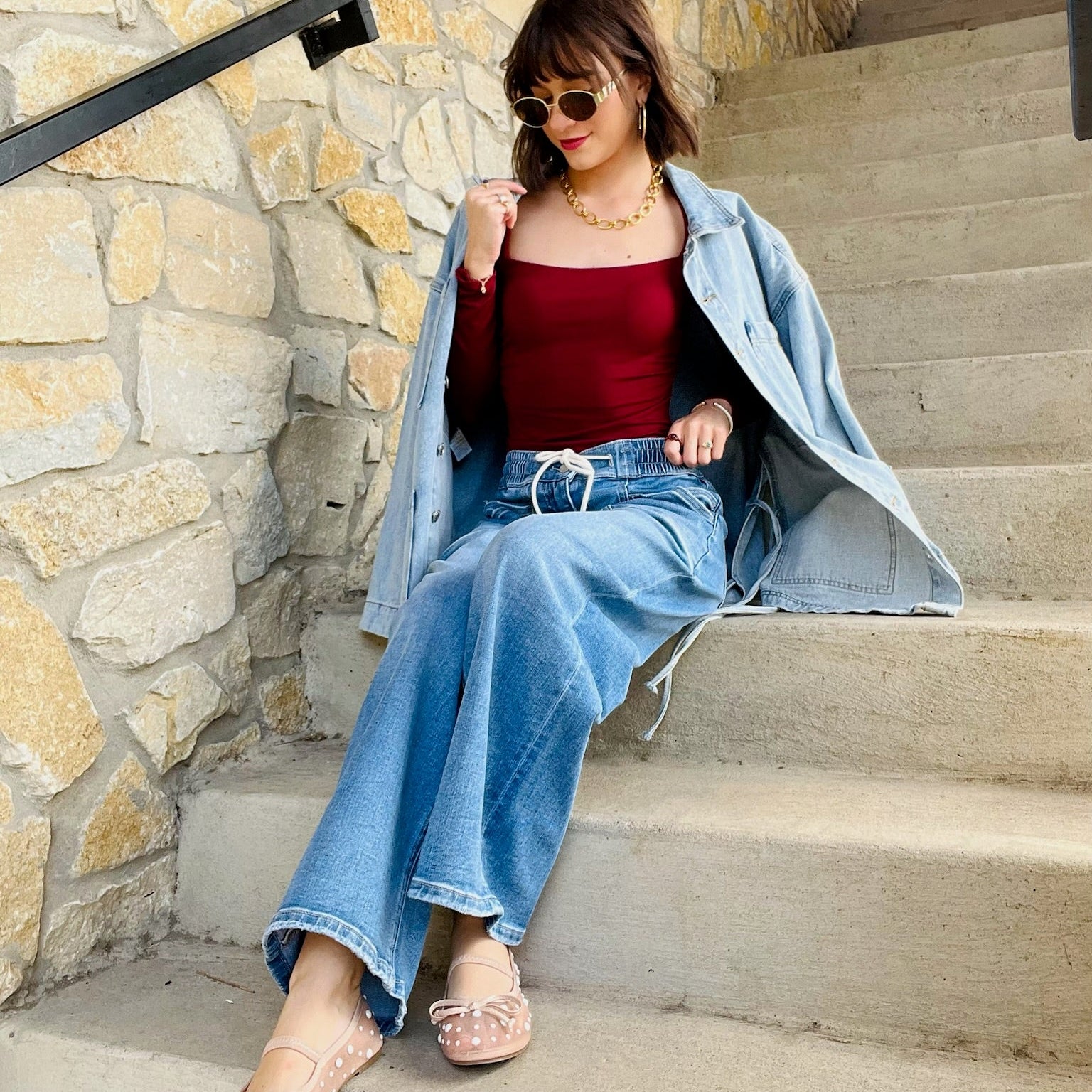 tied up denim jacket, oversized denim jacket, boyfriend fit denim jacket, side tie detail jacket, statement denim jacket, trendy jean jacket, casual oversized jacket, women’s denim outerwear, fall layering piece, front pocket jean jacket, unique denim style, elevated casual outfit, street style denim jacket