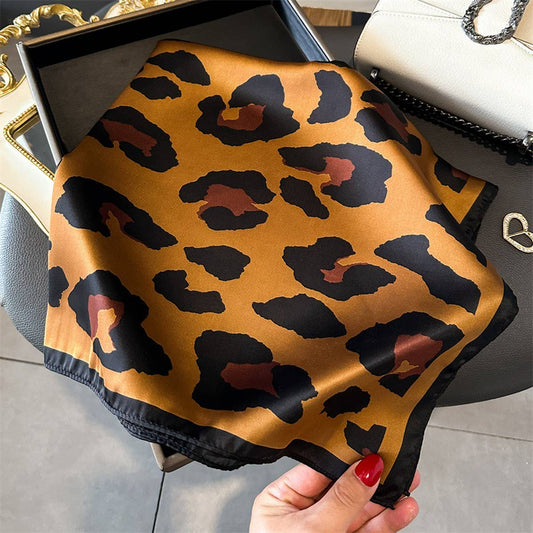 leopard bandana, satin bandana, silky scarf, leopard print accessory, animal print bandana, lightweight scarf, hair scarf, neck scarf, bag scarf, trendy bandana, boutique accessory, women’s bandana, satin hair scarf, fashion accessory, versatile bandana, white leopard scarf