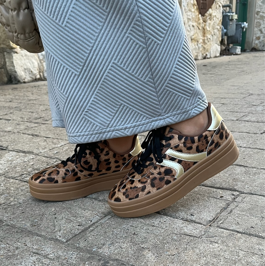 leopard platform sneakers, platform sneakers, leopard sneakers, leopard trend, trending leopard, leopard print, leopard pattern, platform shoes, spring shoes, 2025 shoes, 2025 trends, fun sneakers, casual sneakers