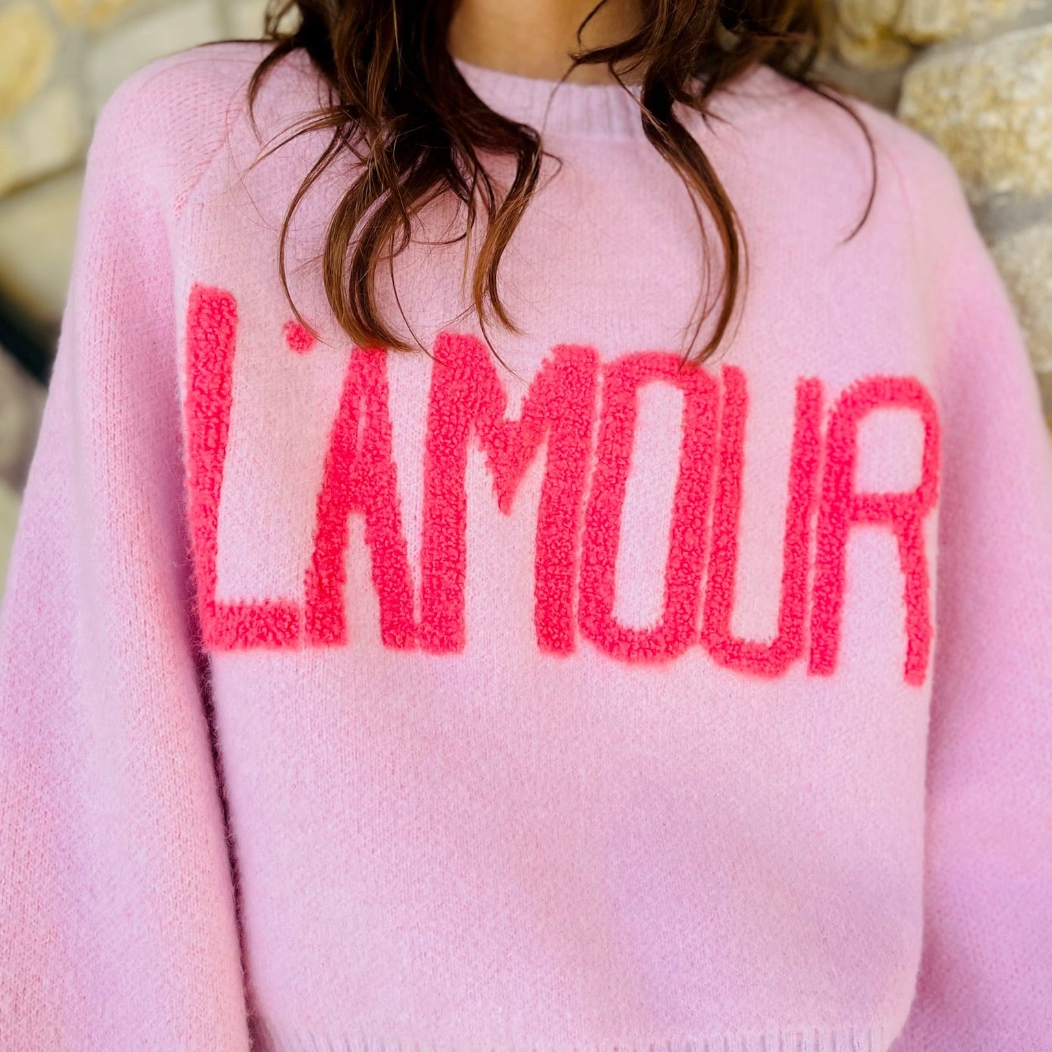 pink sweater, l’amour sweater, love sweater, graphic pullover, cozy chic sweater, valentine sweater, flirty feminine sweater, light pink sweater, pink lettering sweater, relaxed fit pullover, crew neck sweater, ribbed knit sweater, boutique sweater, soft cozy knit, girls night outfit, parisian style sweater, casual chic sweater, cozy gift idea, trendy fall sweater, cute pink sweater