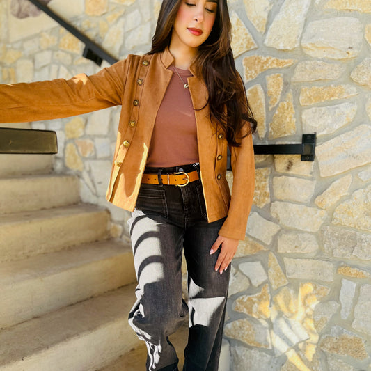 vintage suede jacket, deerskin jacket, faux deerskin jacket, suede mock neck jacket, single breasted jacket, button detail jacket, structured collar jacket, long sleeve suede jacket, vintage inspired outerwear, fall suede jacket, chic suede jacket, soft touch suede jacket, timeless statement jacket, elevated outerwear, boutique suede jacket, women’s suede jacket, classic neutral jacket, minimalist layering jacket, refined fall jacket