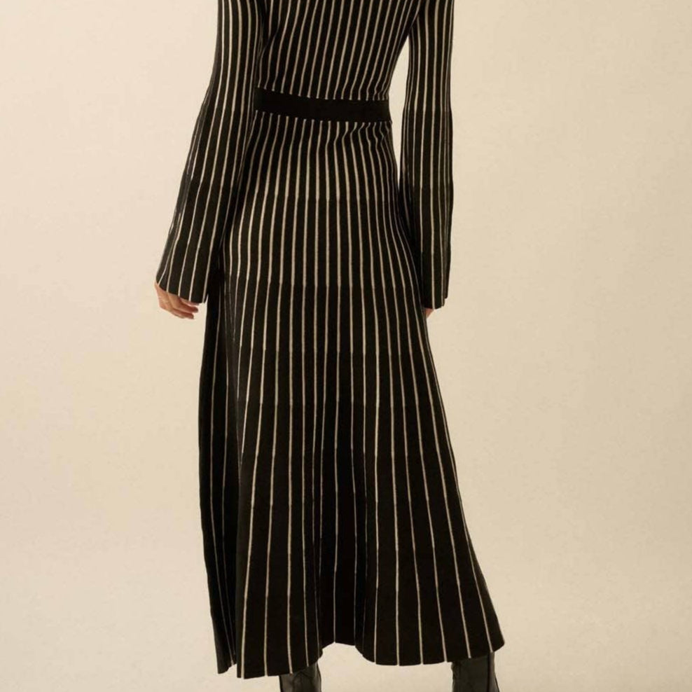 ribbed knit maxi dress, striped maxi dress, black and white knit dress, fall maxi dress, long sleeve sweater dress, mock neck maxi dress, ribbed waistband dress, knit A-line dress, ankle length striped dress, cozy fall dress, city chic maxi dress, relaxed fit sweater dress, bell sleeve knit dress, raglan sleeve maxi dress, cold weather maxi dress, black and white stripe dress, knit maxi for layering, fall fashion dress, long sleeve knitwear dress, ribbed collar maxi dress, warm maxi dress, casual chic fall 