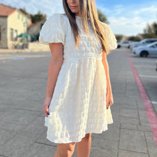 babydoll dress, puff sleeves, puff sleeves dress, babydoll, textured dress, pleated dress, textured babydoll dress, natural dress, boho dress, bohemian dress, staple dress, spring dress, summer dress, fall dress, transition piece, picnic outfit, vacation dress, tan dress, ivory dress