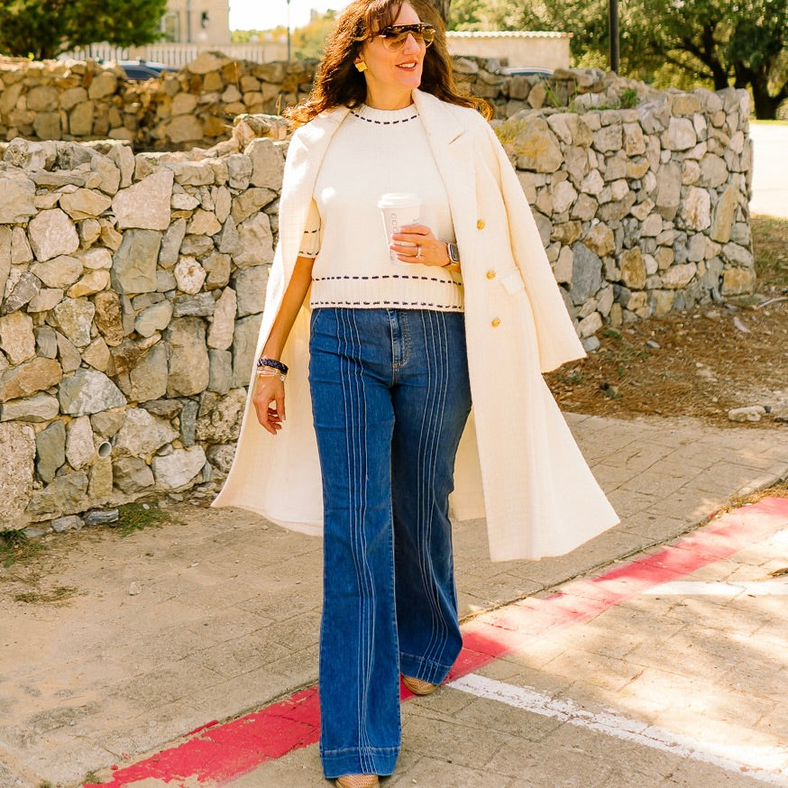 high rise flare jeans, flare denim, stretchy flare jeans, boutique denim, medium wash jeans, double button jeans, pin tuck detail jeans, flattering flare pants, women’s high waist denim, chic flare jeans, everyday denim, trendy boutique jeans, comfortable stretch jeans, classic blue flare jeans, leg-lengthening jeans, polished denim look, dressy flare jeans, casual work jeans, must-have fall denim, versatile blue jeans, stylish flare fit, comfy flattering jeans, wardrobe staple denim