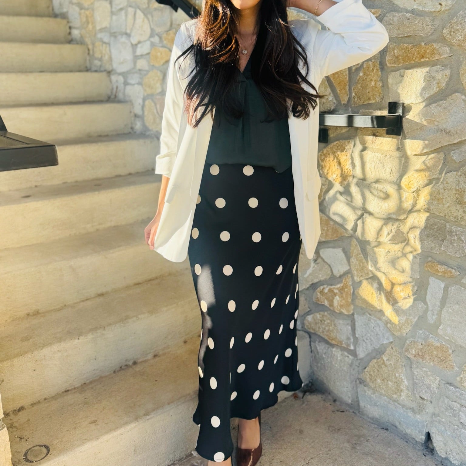 black midi skirt, polka dot midi skirt, cream polka dots, fitted midi skirt, Le Lis skirt, chic midi skirt, classic polka dot skirt, transitional wardrobe piece, fall midi skirt, winter midi skirt, versatile black skirt, workwear skirt, dinner outfit skirt, concert outfit skirt, game day skirt, elevated basics, boutique midi skirt, stretchy midi skirt, polyester spandex skirt, timeless polka dot print, neutral print skirt