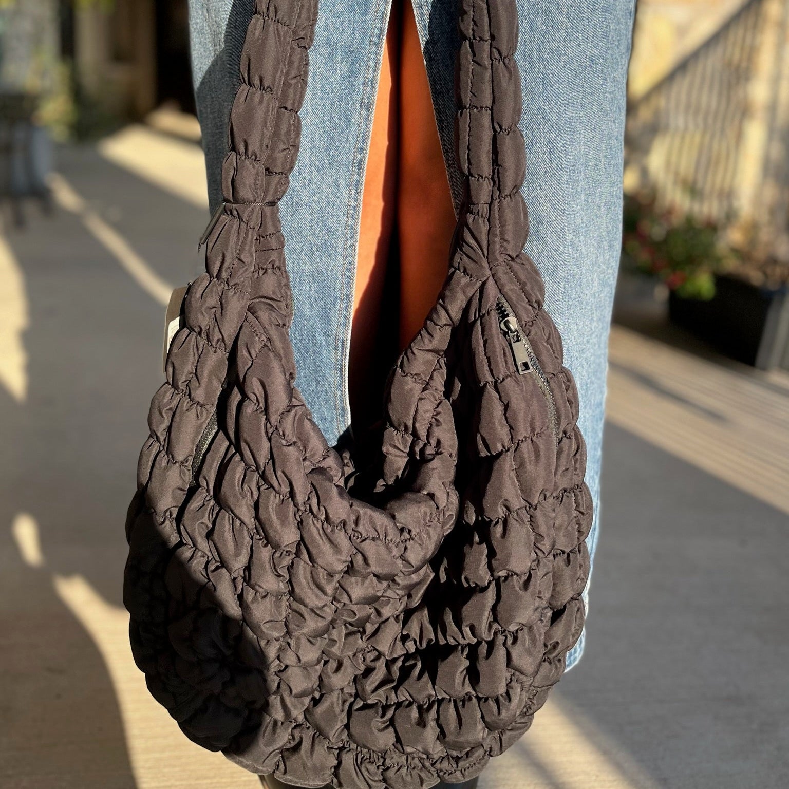 puff quilted shoulder bag, oversized crossbody bag, everyday shoulder bag, Free People dupe bag, trendy quilted bag, black quilted bag, beige quilted bag, spacious crossbody purse, boutique shoulder bag, casual chic bag, stylish oversized purse, hands-free crossbody bag, fashion dupe bag, quilted shoulder purse, versatile everyday bag, easy clean shoulder bag, statement bag for women, popular dupe bag, trendy oversized bag, functional quilted bag, Free People inspired bag