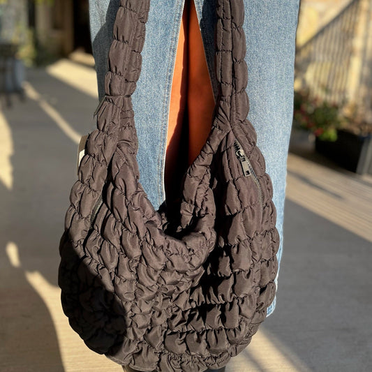 puff quilted shoulder bag, oversized crossbody bag, everyday shoulder bag, Free People dupe bag, trendy quilted bag, black quilted bag, beige quilted bag, spacious crossbody purse, boutique shoulder bag, casual chic bag, stylish oversized purse, hands-free crossbody bag, fashion dupe bag, quilted shoulder purse, versatile everyday bag, easy clean shoulder bag, statement bag for women, popular dupe bag, trendy oversized bag, functional quilted bag, Free People inspired bag