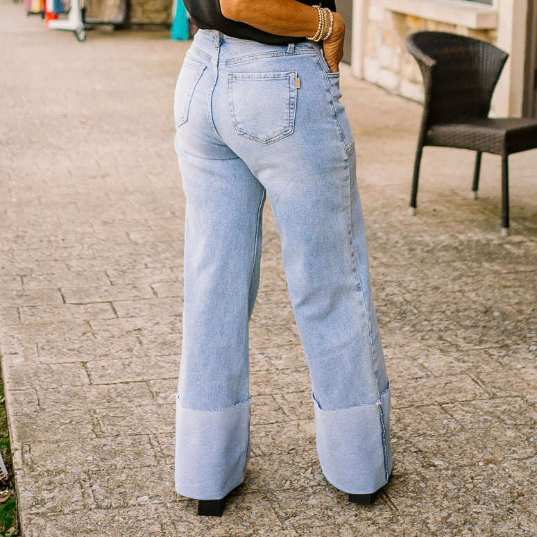 stretchy wide leg jeans, high rise jeans, medium wash denim, folded hem jeans, comfy stretch jeans, wide jeans for women, relaxed fit denim, casual everyday jeans, flattering high waist denim, big pocket jeans, classic 5 pocket jeans, zip fly jeans, trendy wide leg denim, soft stretchy jeans, must have denim, comfortable wide jeans, modern casual jeans, versatile medium wash jeans, cotton spandex jeans, cute and comfy jeans