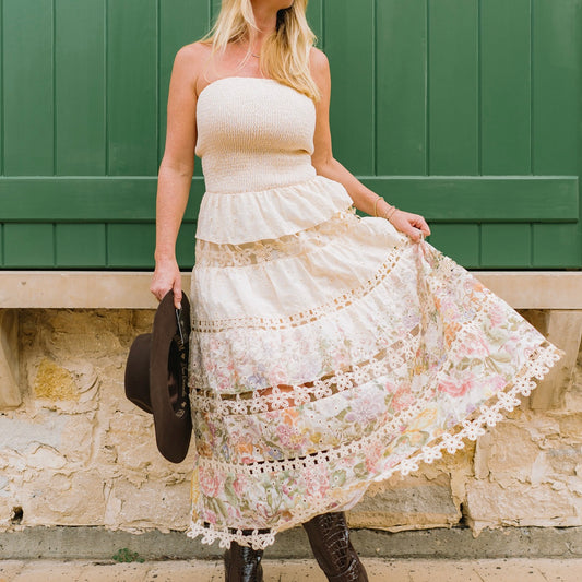 floral midi dress, strapless midi dress, smocked bodice dress, embroidered floral dress, eyelet lace dress, crocheted lace dress, scalloped hem dress, Ever After dress, romantic floral dress, feminine date night dress, wedding guest dress, weekend outfit dress, boutique women’s dress, summer floral dress, spring midi dress, flirty tube dress, romantic embroidered dress, whimsical floral dress, chic strapless dress, elegant cotton dress, dry clean dress, versatile midi dress, statement floral dress