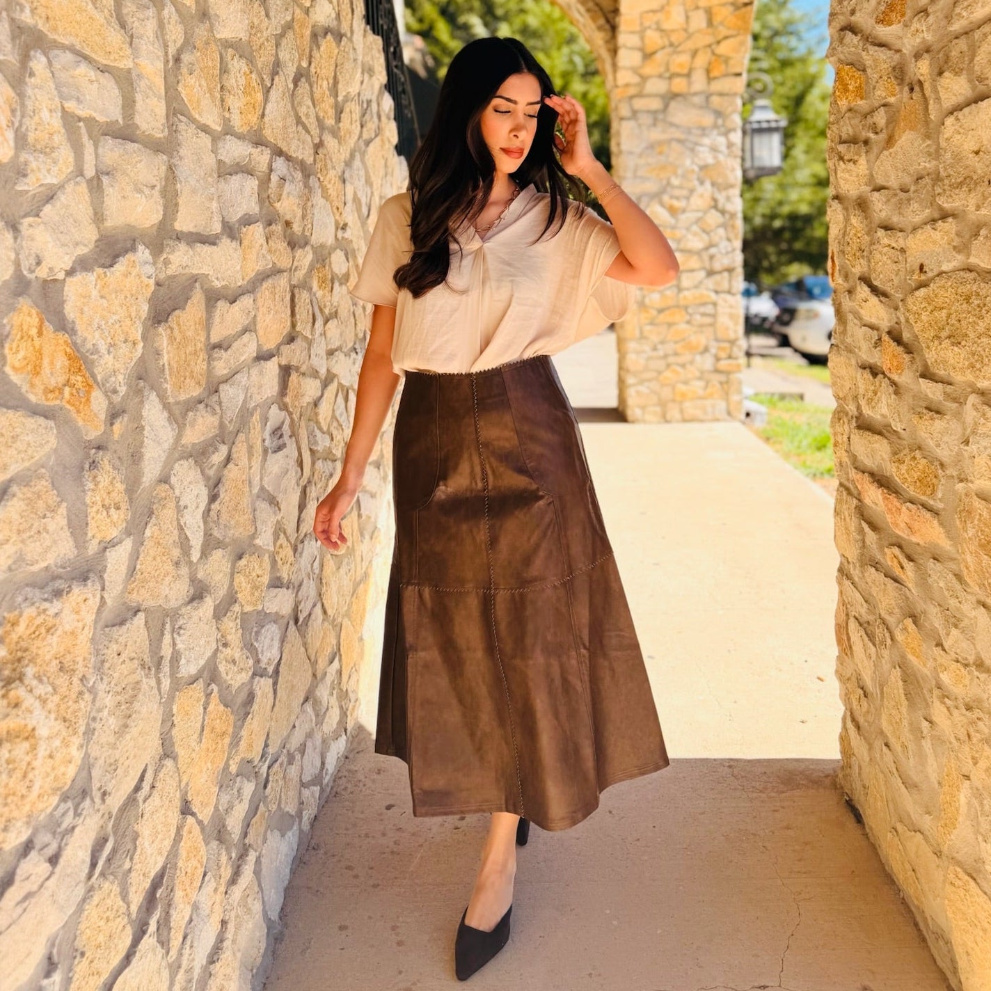 The Celine Faux Leather Midi Skirt