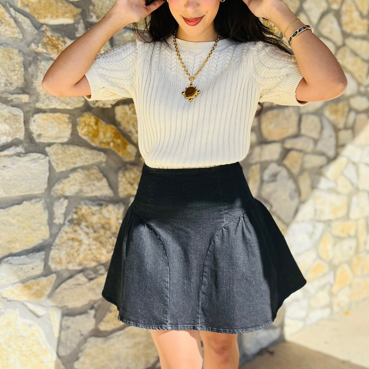 black flare mini skirt, black denim mini skirt, flared mini skirt, stretchy mini skirt, black skirt for all seasons, versatile mini skirt, year-round skirt, fall mini skirt, winter mini skirt, spring mini skirt, summer mini skirt, mini skirt with back zipper, casual black skirt, dressy black mini skirt, comfortable denim skirt, black skirt with stretch, soft denim mini skirt, high waist mini skirt, game day skirt, transitional mini skirt, wardrobe staple skirt, everyday black skirt, flattering mini skirt