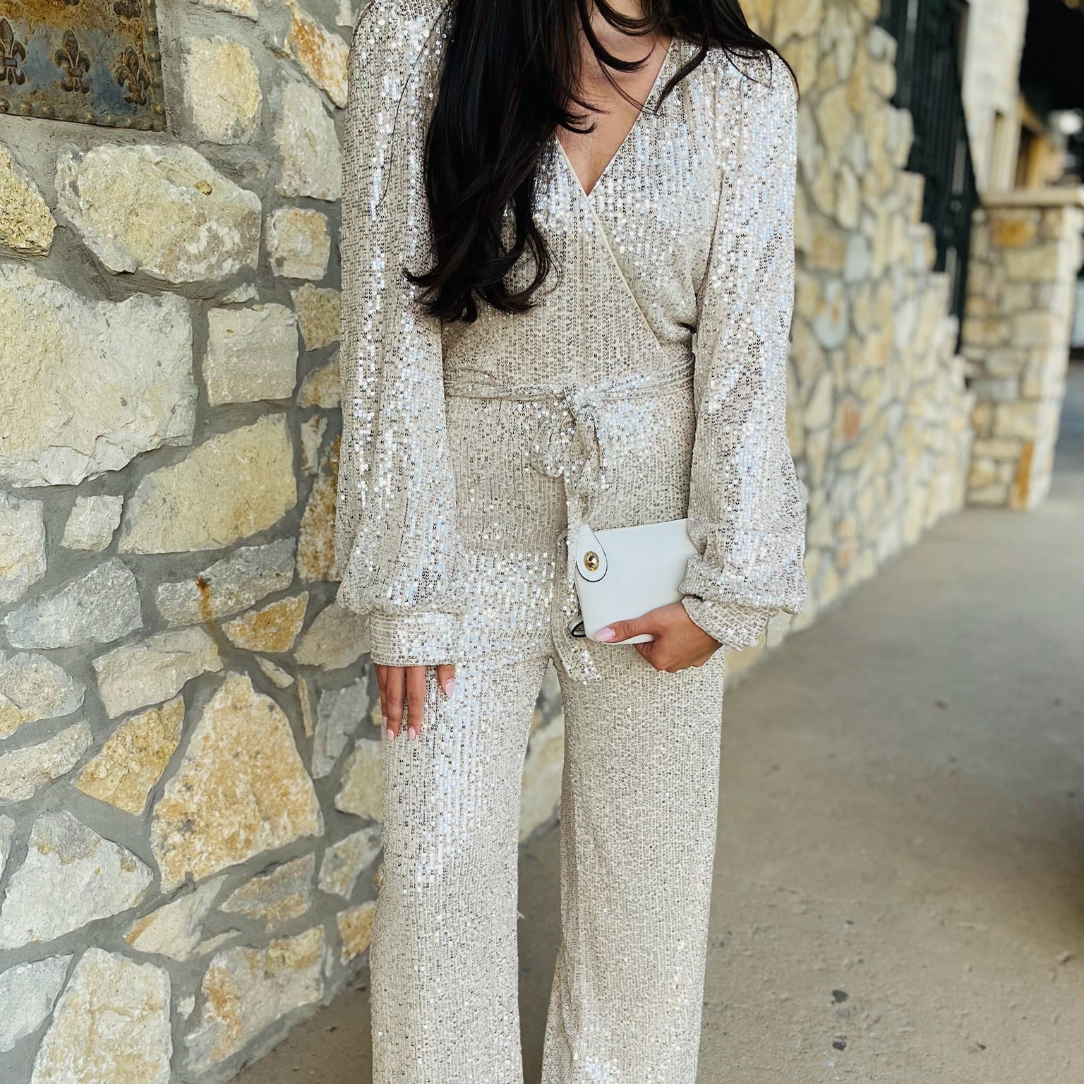 sequin jumpsuit, holiday jumpsuit, sparkly jumpsuit, long sleeve jumpsuit, v neck sequin jumpsuit, bishop sleeve jumpsuit, wrap tie waist jumpsuit, champagne sequin jumpsuit, navy sequin jumpsuit, black sequin jumpsuit, white sequin jumpsuit, party outfit, new year’s eve outfit, dressy jumpsuit, glam jumpsuit, evening wear jumpsuit, winter event outfit, statement jumpsuit, chic sequin one piece, formal jumpsuit for women