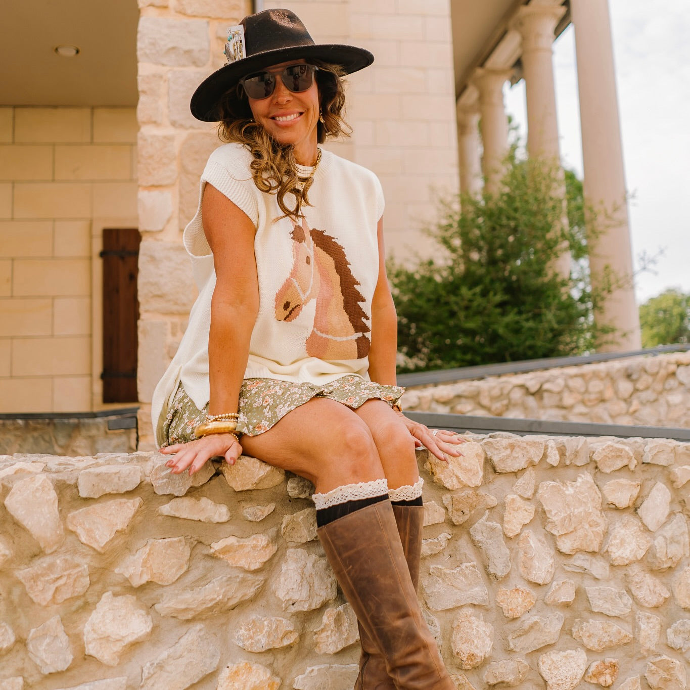 horse graphic sweater, western sweater top, oversized knit top, sleeveless sweater, tie detail sweater, side slit top, casual western sweater, lightweight knit top, acrylic sweater for women, boutique western fashion, horse lover top, trendy graphic sweater, chic oversized sweater, versatile summer knit, layered sweater top, western inspired clothing, statement knit top, stylish sleeveless sweater, casual boutique top, western chic sweater, fun graphic top, unique horse sweater, fall layering sweater