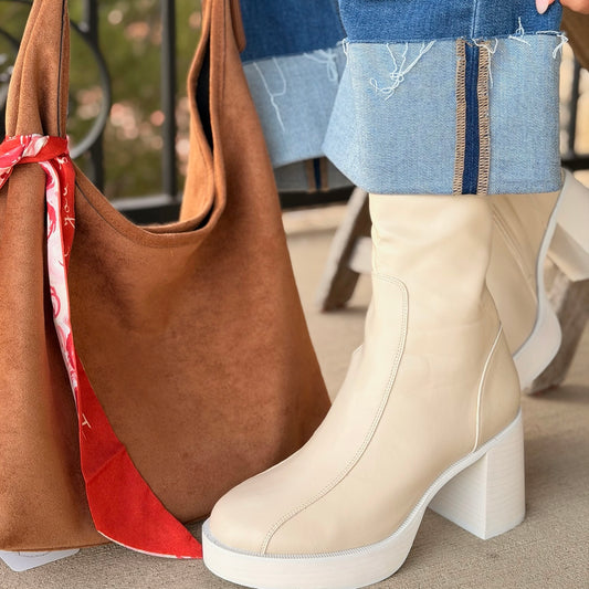 cream platform boots, beige go go boots, retro platform boots, mid calf platform boots, women’s platform boots, neutral statement boots, spring transition boots, fall to spring boots, light color boots, neutral boots for spring, year round boots women, go go inspired boots, chunky heel boots, rounded toe platform boots, zip up platform boots, faux leather boots women, mid calf boots women, boots for dresses, boots with wide leg jeans, boots with skirts, statement boots women, everyday platform boots