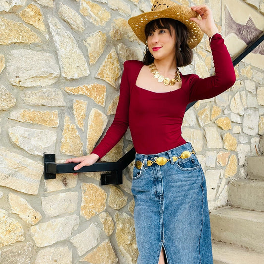 long sleeve bodysuit, square neck bodysuit, fitted bodysuit, stretchy bodysuit, nylon elastane bodysuit, versatile wardrobe essential, chic layering piece, flattering bodysuit for women, everyday basics, sleek square neckline, snap closure bodysuit, form-fitting top, dress up or down, minimalist style bodysuit, trendy neutral bodysuit