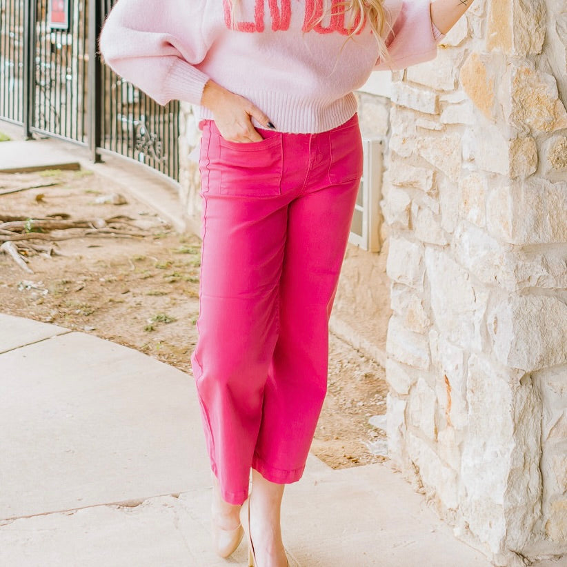 pink jeans, hot pink denim, cropped wide leg jeans, high rise pink pants, bold color denim, statement jeans, trendy pink jeans, wide leg crop denim, colorful boutique jeans, fun pink outfit, work appropriate colored jeans, school outfit denim, comfort stretch jeans, square pocket jeans, women’s wide leg jeans, fashion forward denim, vibrant pink pants, trendy fall denim, bold color statement piece, stylish pink bottoms, boutique color denim, flattering cropped jeans