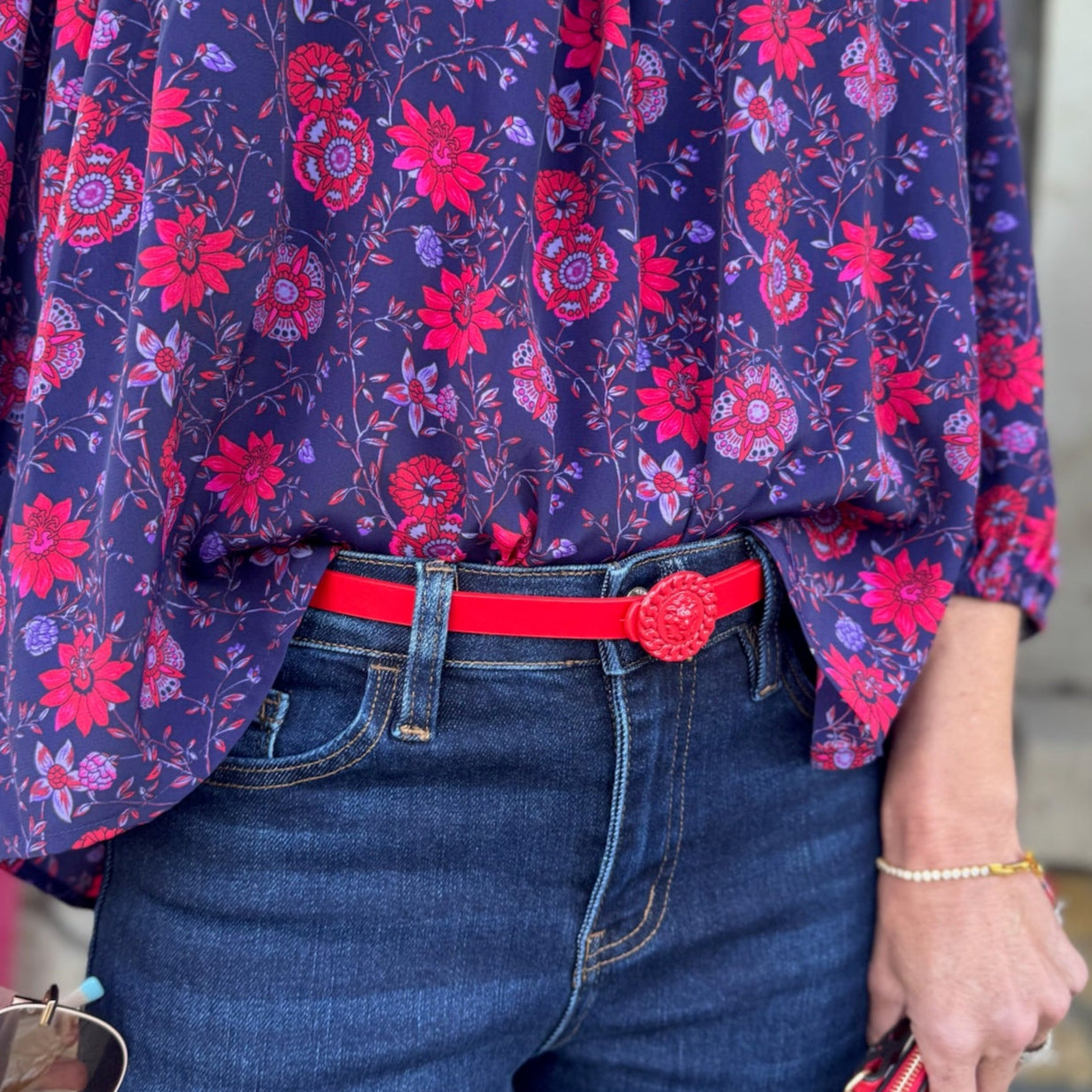 lion buckle belt, statement belt for women, round buckle belt, chain detail belt, trendy boutique belt, adjustable fashion belt, chic waist belt, bold statement accessory, animal inspired belt, luxury style belt, black and gold belt, red and gold belt, clear fashion belt, colorful boutique belt, versatile women’s belt, stylish outfit accessory, trendy fall accessories, boutique fashion belt, modern chain buckle belt, dress up belt, unique buckle design, statement waist belt, high-end look belt